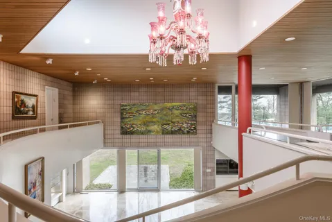 a view of a living room and front door