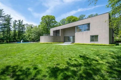 a view of a park with large trees