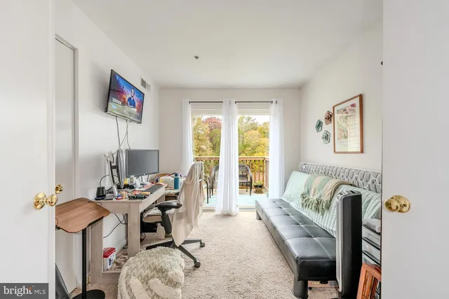 a view of balcony with furniture