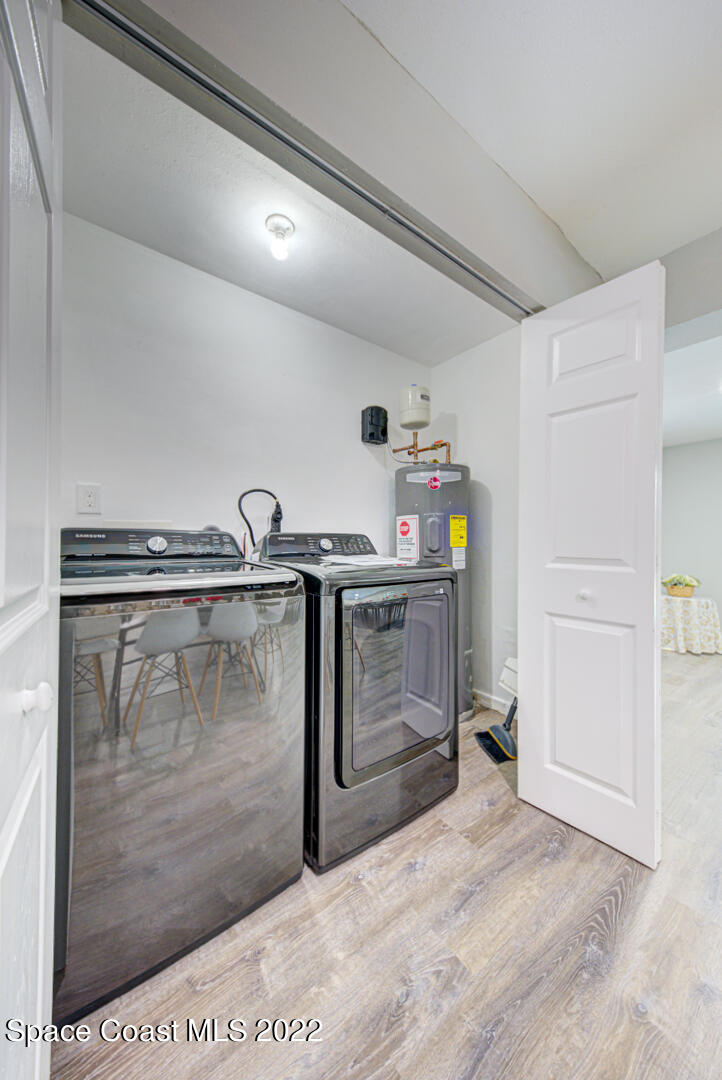758 Buffalo Road Titusville, FL 32796 - Photo 37 of 52 a utility room with dryer and washer