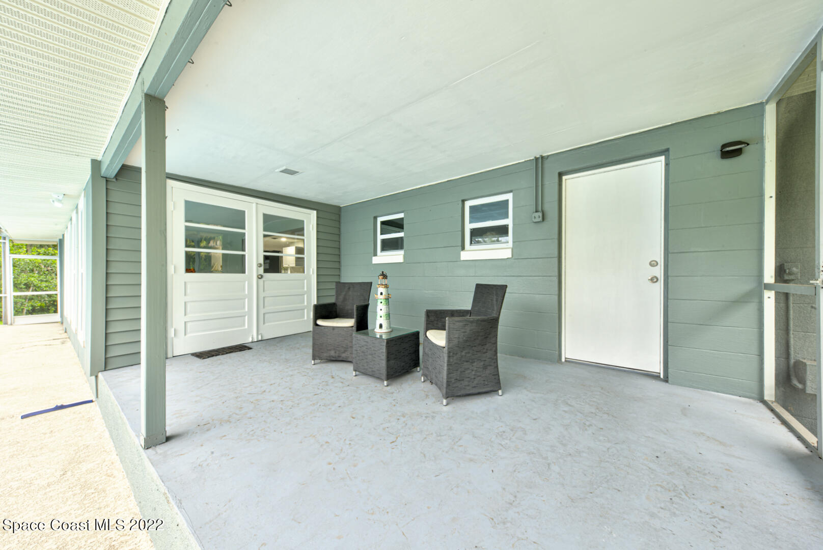 758 Buffalo Road Titusville, FL 32796 - Photo 39 of 52 a view of a livingroom with furniture and a window