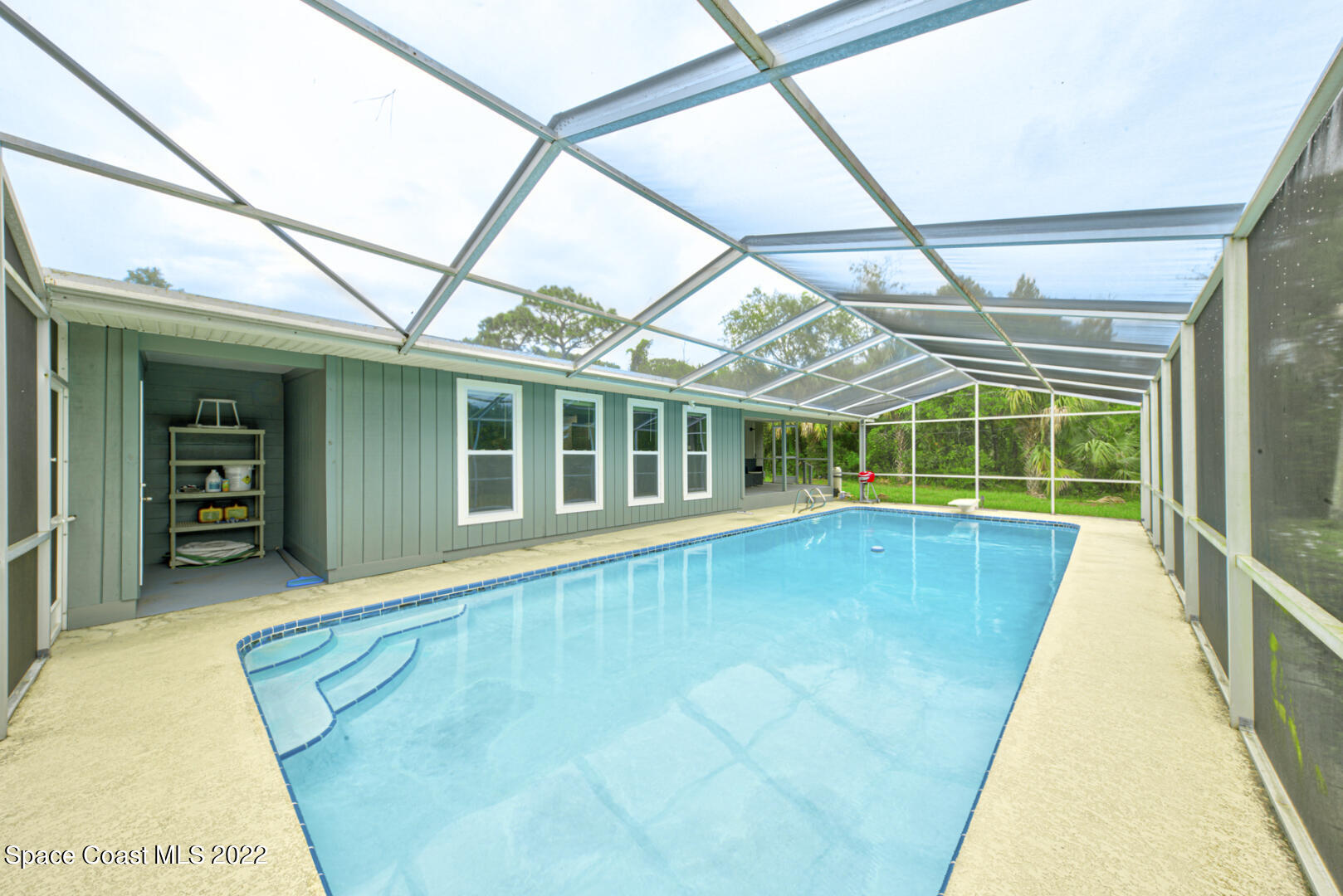 758 Buffalo Road Titusville, FL 32796 - Photo 42 of 52 a view of indoor pool and deck