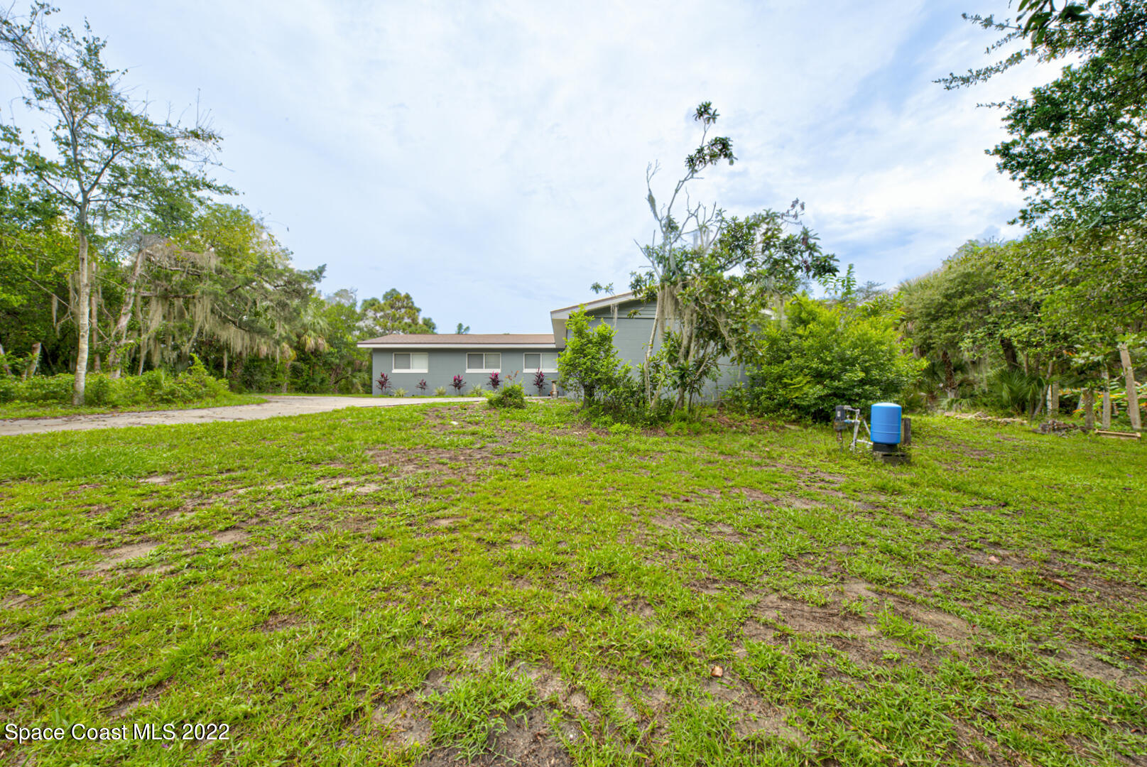 758 Buffalo Road Titusville, FL 32796 - Photo 50 of 52 a house view with a garden space