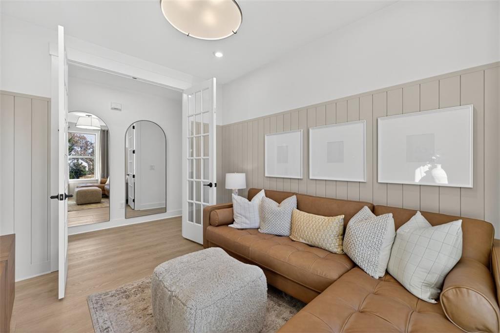 5425 Cordina Road Hoschton, GA 30548 - Photo 14 of 30 a living room with furniture and a couch