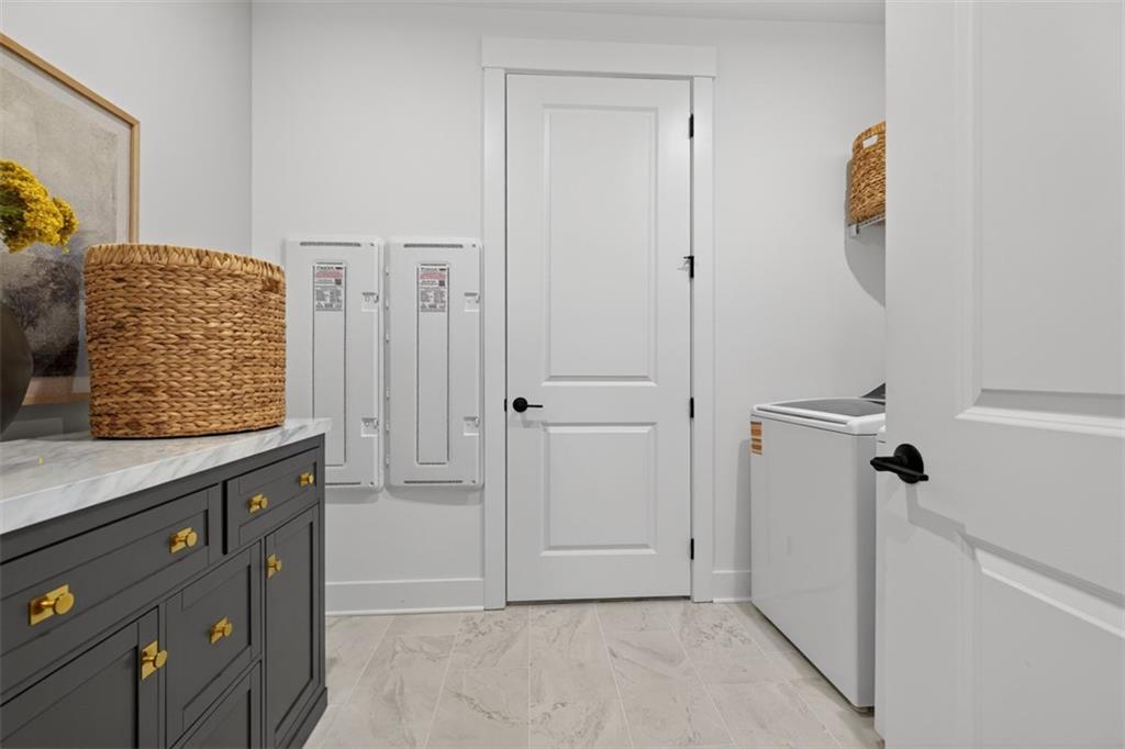 5425 Cordina Road Hoschton, GA 30548 - Photo 19 of 30 a bathroom with a shower