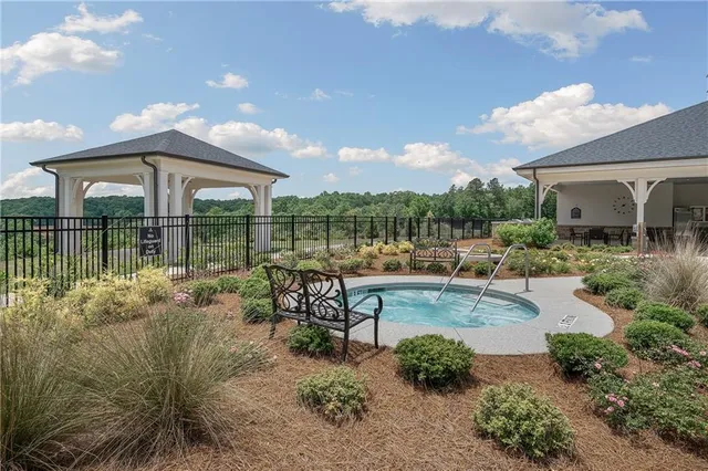 a view of a park with a large tree