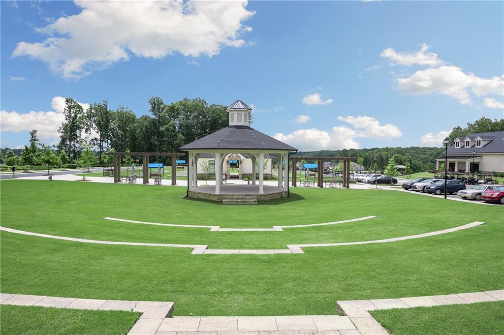 5425 Cordina Road Hoschton, GA 30548 - Photo 30 of 30 a front view of a house with a garden