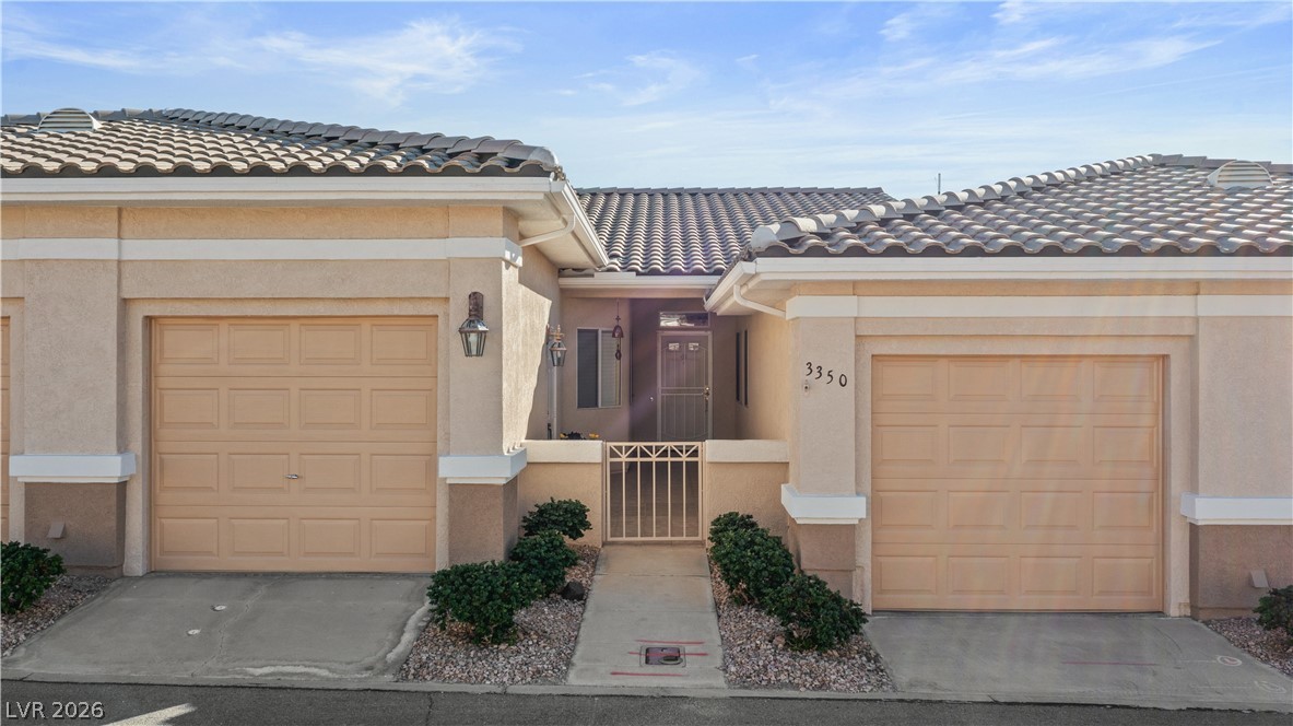 3350 Pheasant Canyon Way, Unit 1008 Laughlin, NV 89029 - Photo 71 of 80 View of front of property with stucco siding and a tile roof