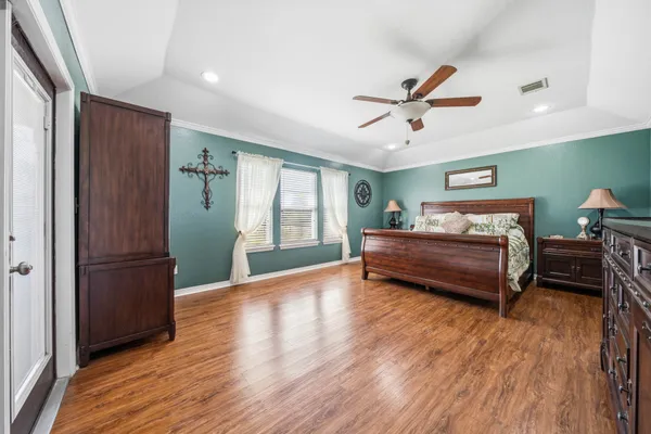 a large spacious bathroom with a large tub shower and sink