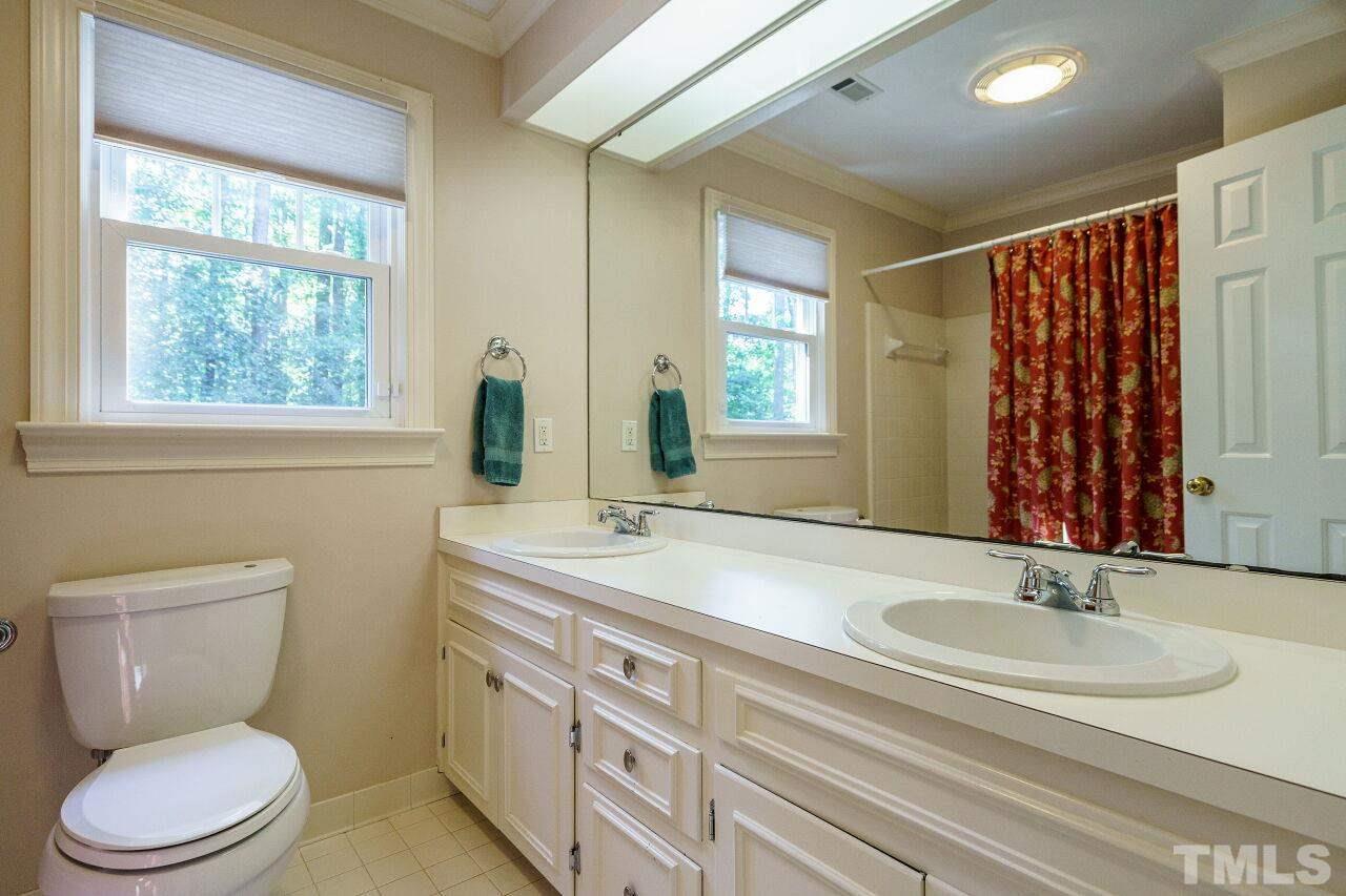 11000 Coachmans Way Raleigh, NC 27614 - Photo 22 of 30 Hall Bathroom with Tub and Shower.