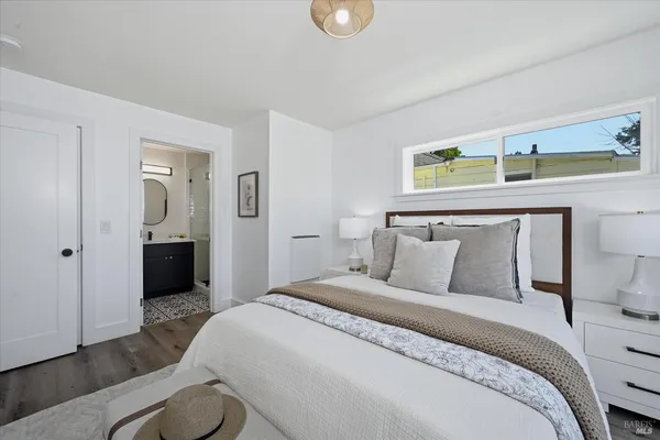 a bedroom with a bed and closet