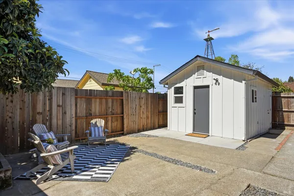 a front view of a house with patio