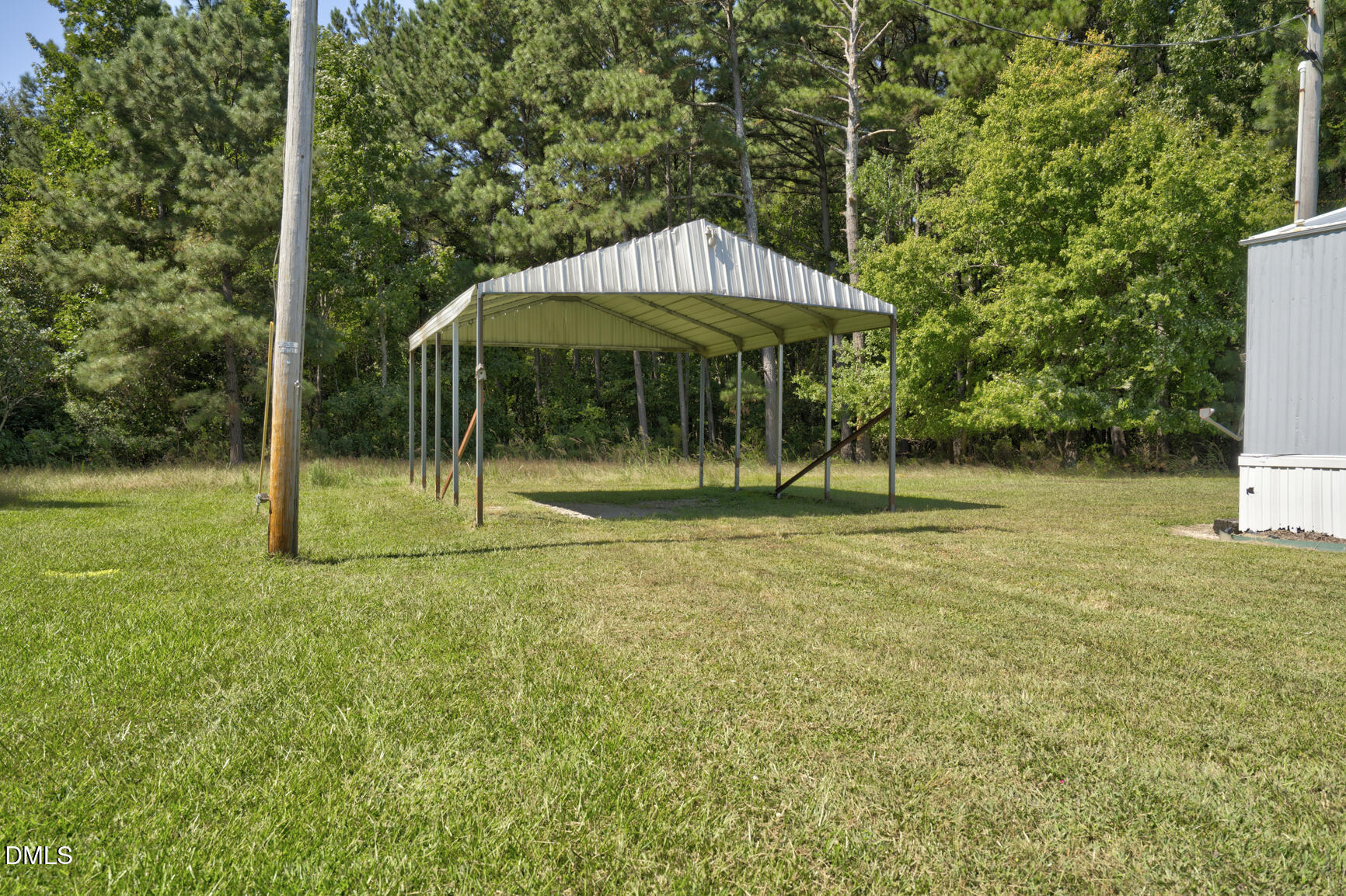6515 Tonya Road Elm City, NC 27822 - Photo 41 of 52 a backyard of a house with lots of green space