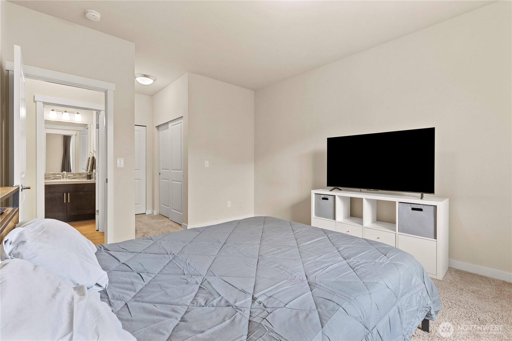 396 South Sergeant Street Buckley, WA 98321 - Photo 17 of 39 a bedroom with a bed and a flat screen tv