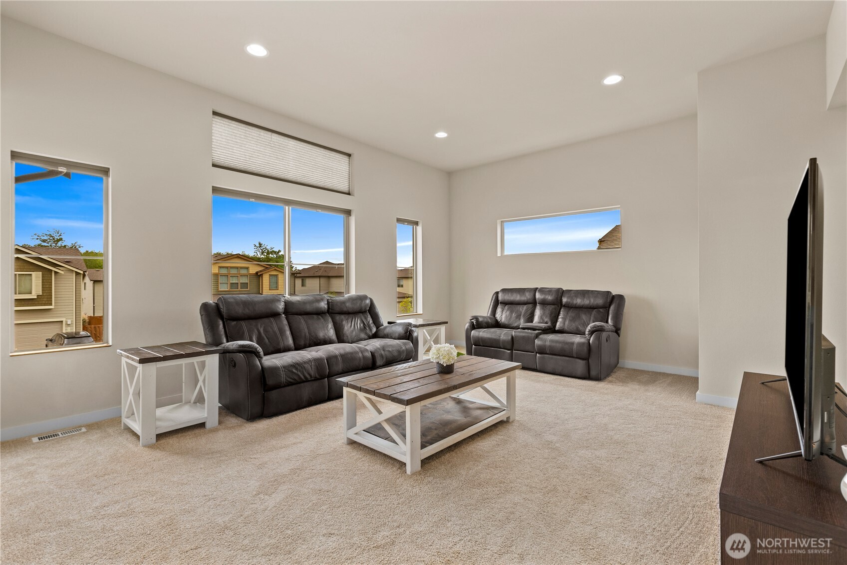 396 South Sergeant Street Buckley, WA 98321 - Photo 19 of 39 a living room with furniture and a flat screen tv