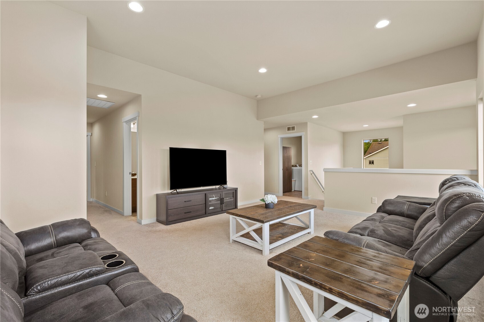396 South Sergeant Street Buckley, WA 98321 - Photo 21 of 39 a living room with furniture and a flat screen tv