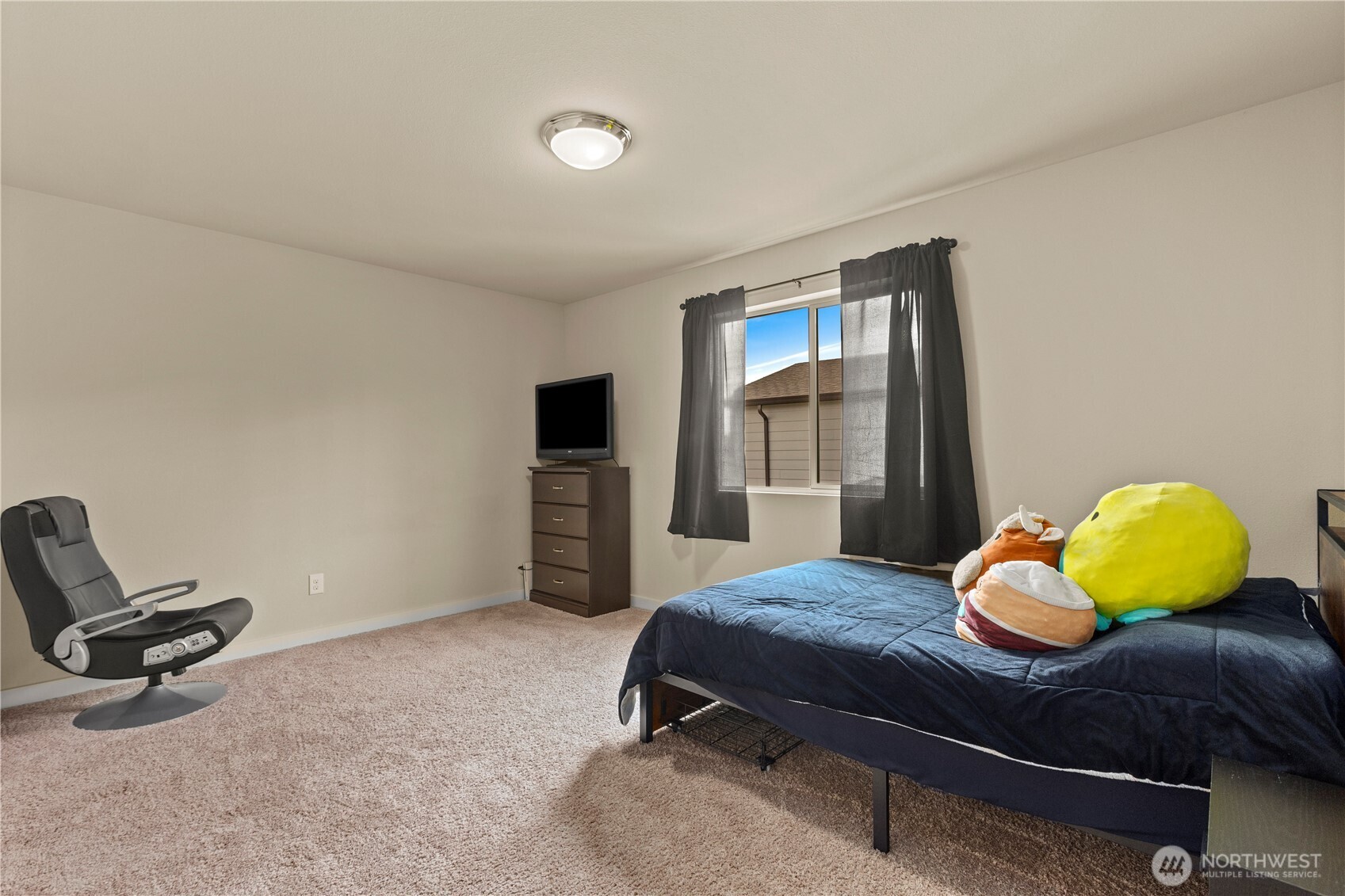 396 South Sergeant Street Buckley, WA 98321 - Photo 23 of 39 a living room with a table and gym equipment