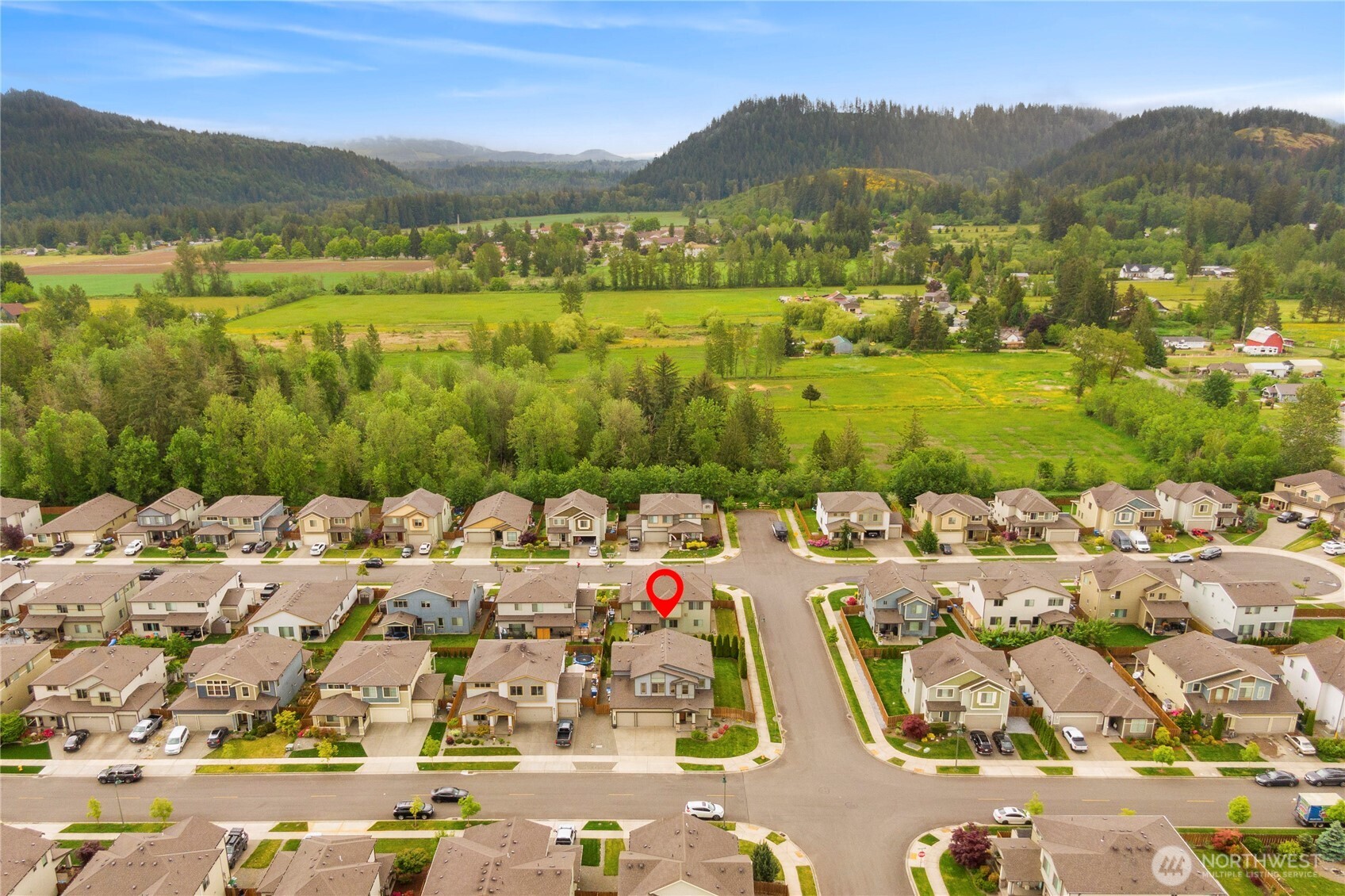 396 South Sergeant Street Buckley, WA 98321 - Photo 39 of 39 a view of a city with mountains in the background