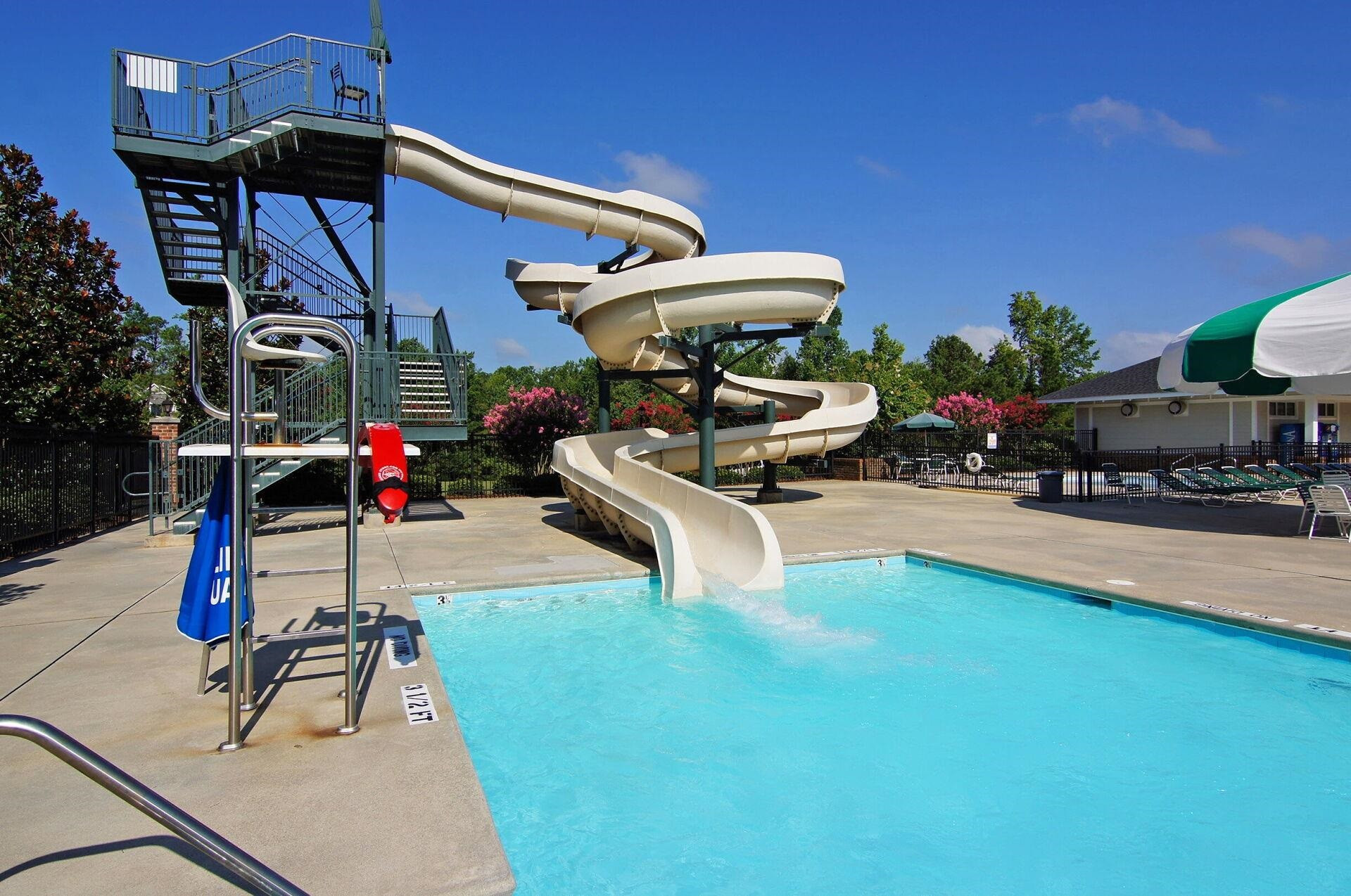 117 Kingsport Road Holly Springs, NC 27540 - Photo 30 of 41 Live like you're on vacation 365 days a year with a lazy river, club house, spray ground, water slide and park. There is no shortage of fun venues in the magnificent Sunset Community. Swimming Pool/Hot Tub/Sauna