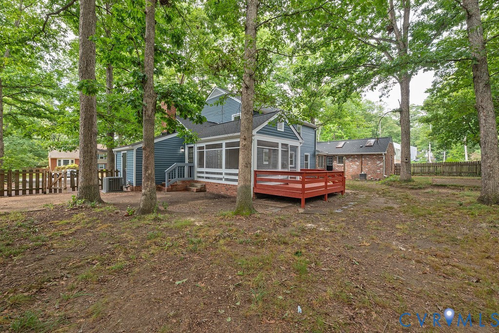11840 Winfore Drive Midlothian, VA 23113 - Photo 36 of 40 Expansive backyard featuring a red wood-finish dec