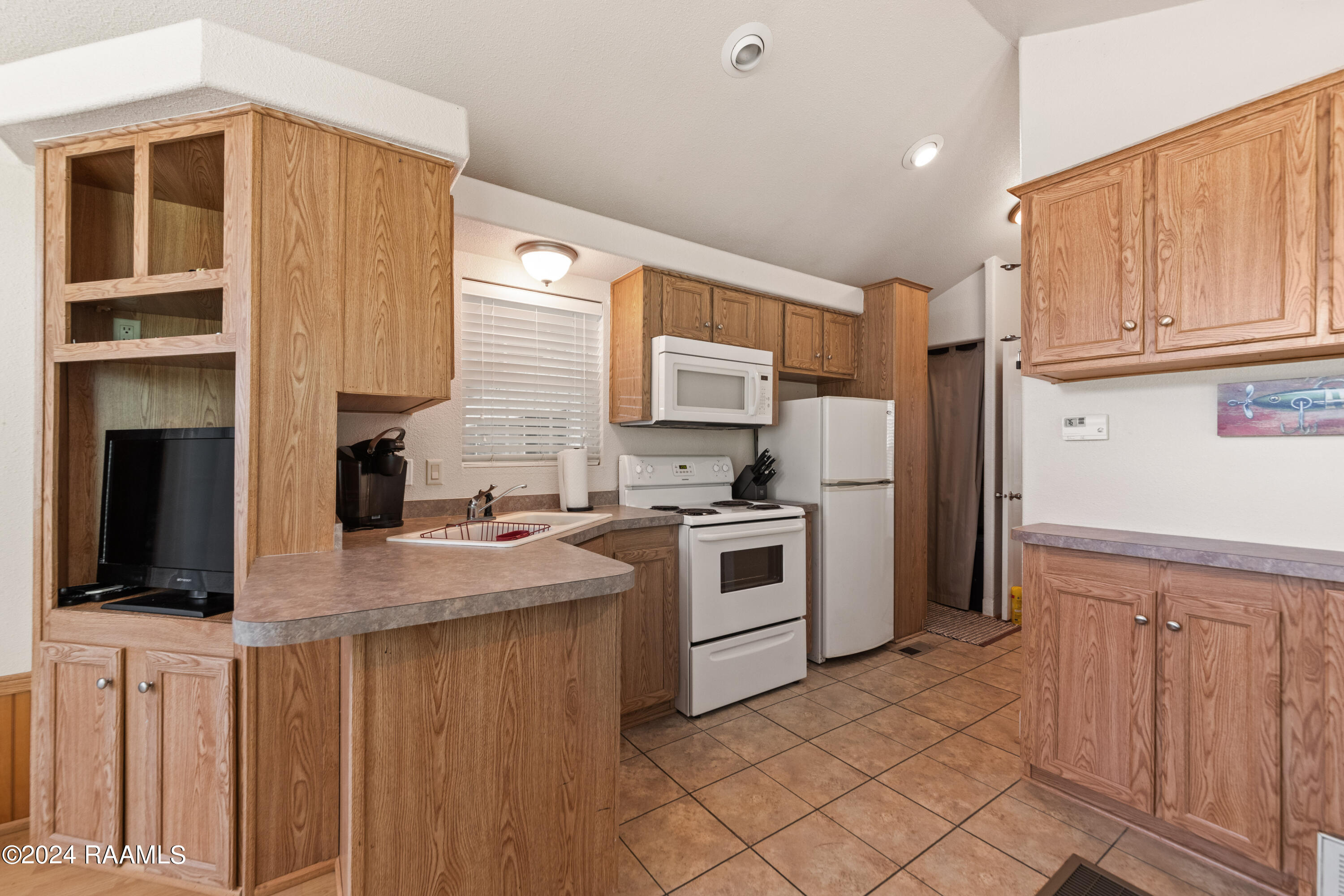 1082 Herman Dupuis Road Breaux Bridge, LA 70517 - Photo 13 of 40 Kitchen in main house