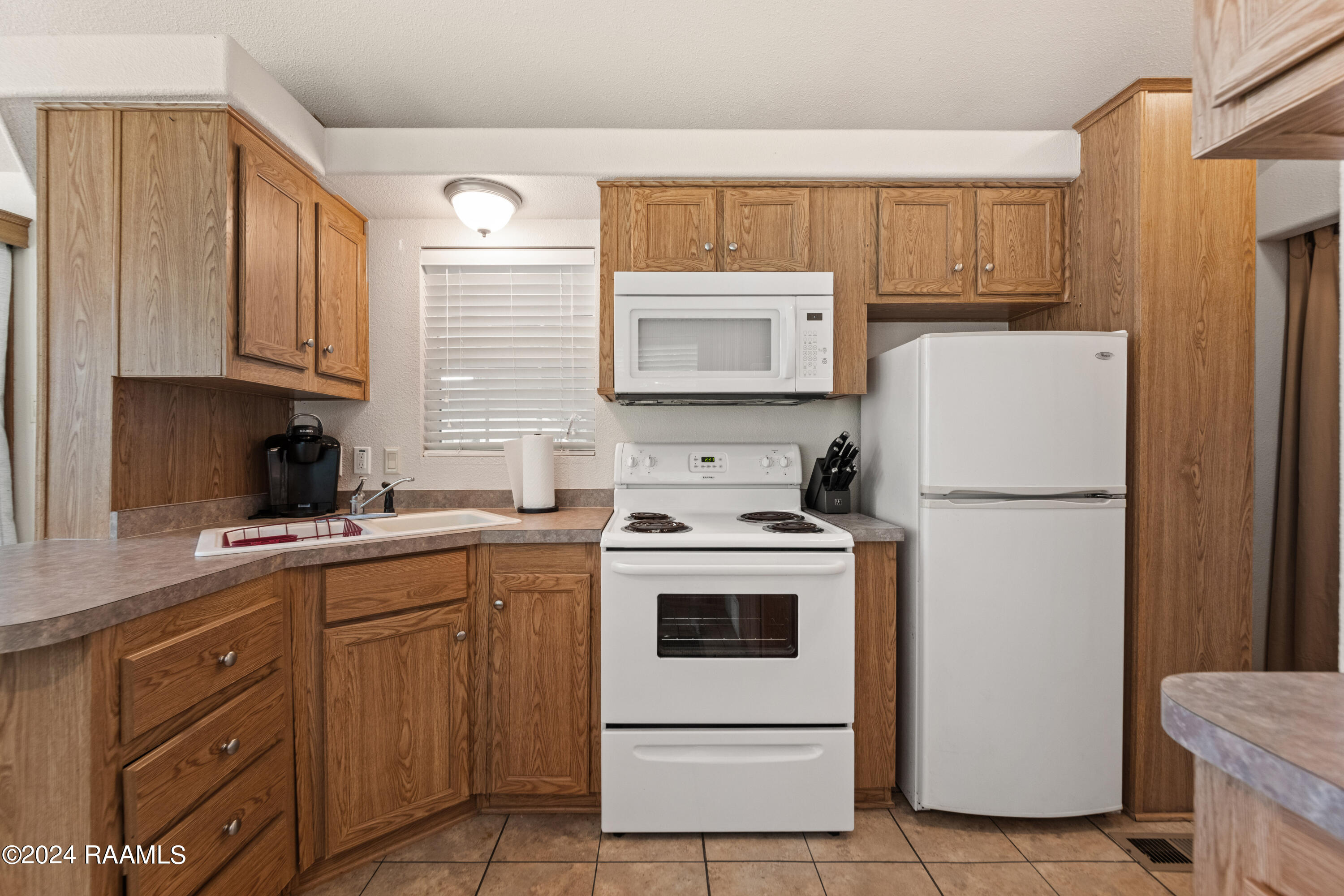 1082 Herman Dupuis Road Breaux Bridge, LA 70517 - Photo 14 of 40 Main house kitchen