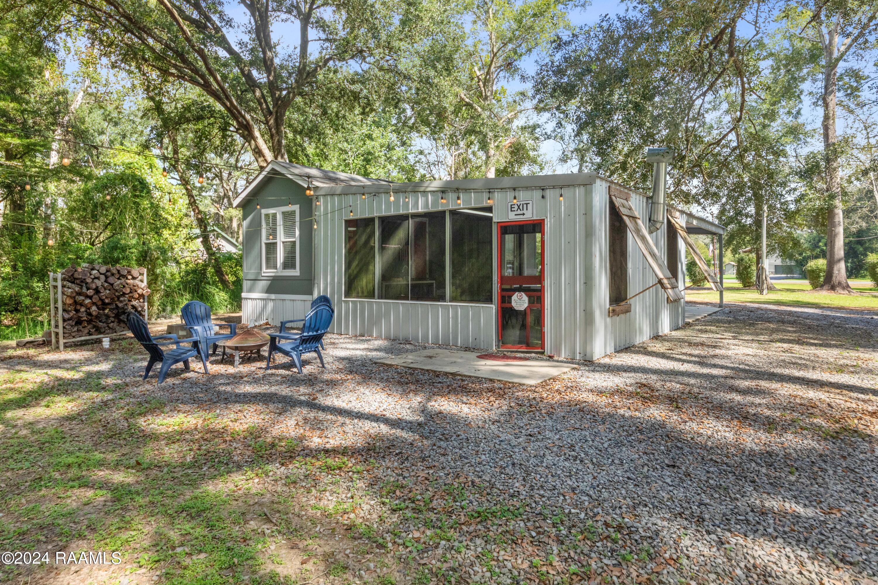1082 Herman Dupuis Road Breaux Bridge, LA 70517 - Photo 17 of 40 Fully screened in patio