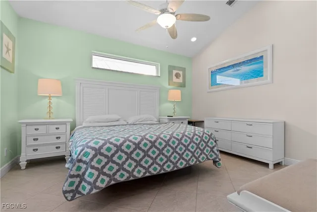 a bedroom with a bed and a cabinets