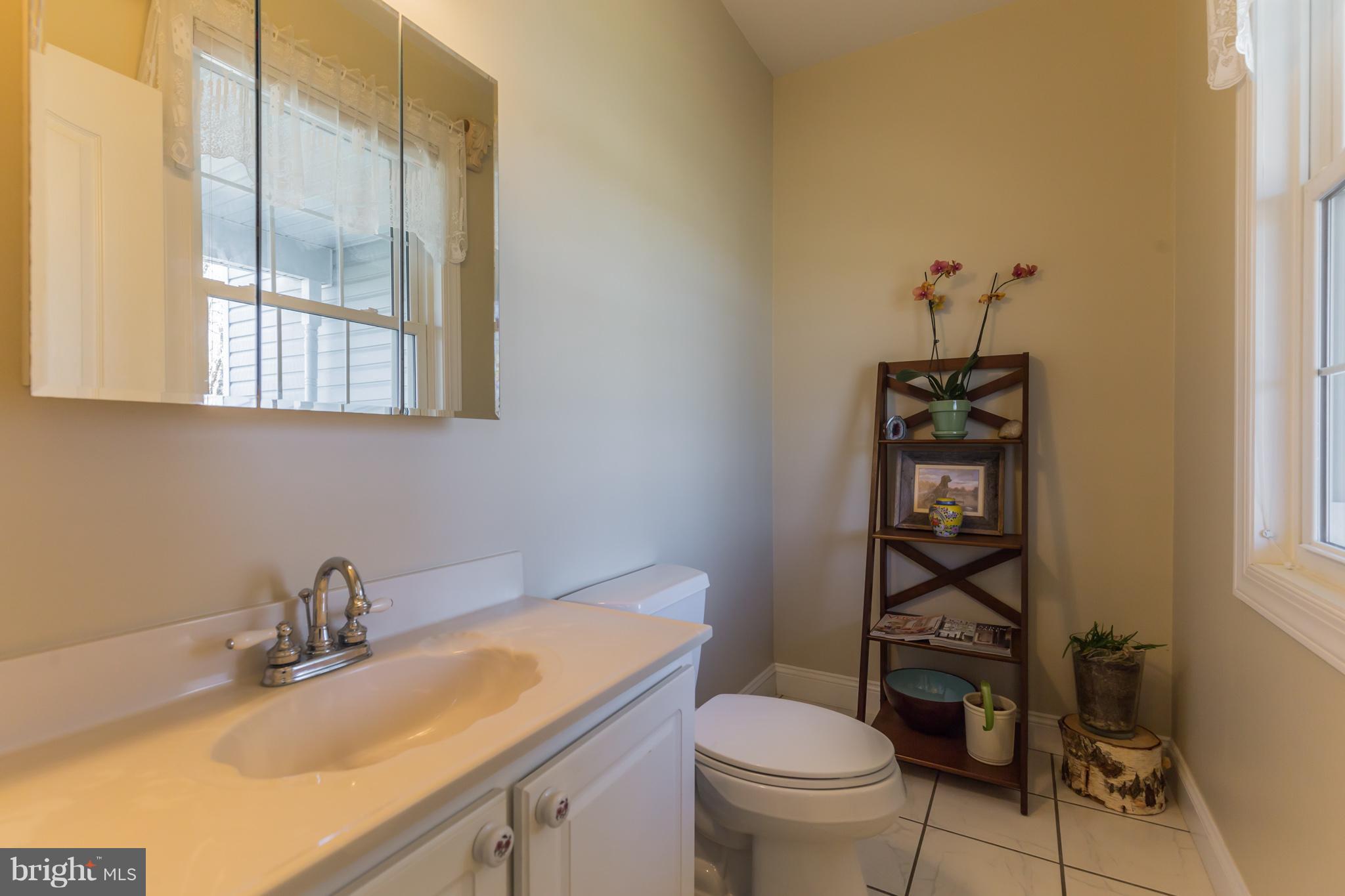 268 Swaggers Point Road Solomons, MD 20688 - Photo 11 of 27 Half Bath on main floor