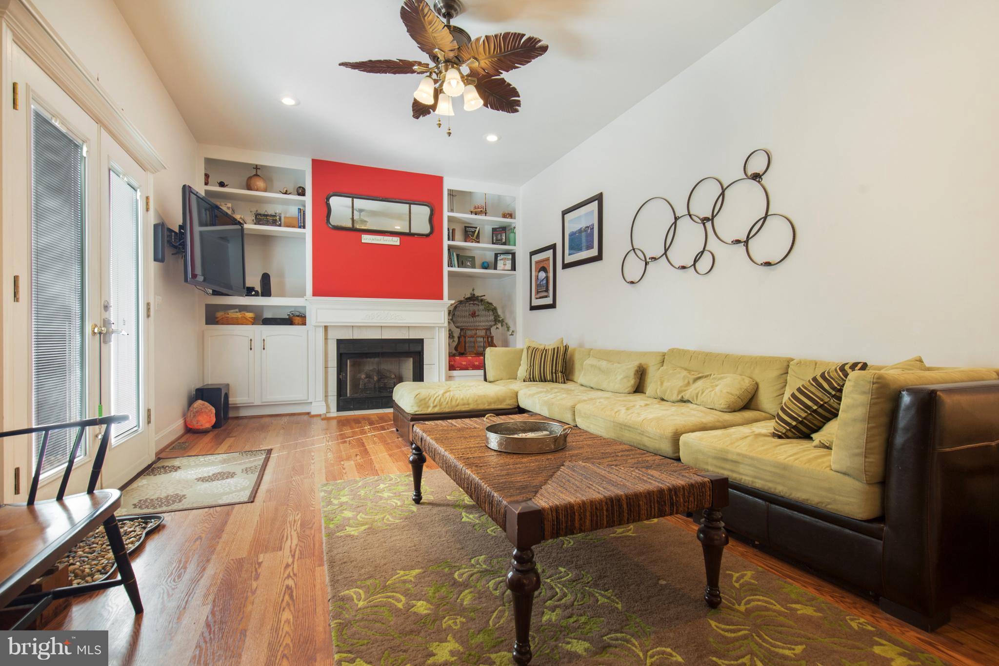 268 Swaggers Point Road Solomons, MD 20688 - Photo 9 of 27 Built-ins, soaring ceilings and gas FP.