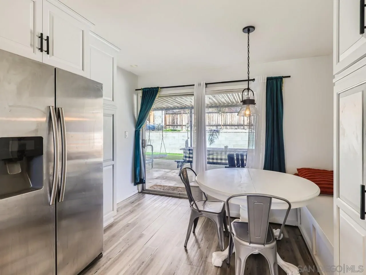 9456 Domer Road Santee, CA 92071 - Photo 12 of 30 a view of a dining room with furniture window and outside view