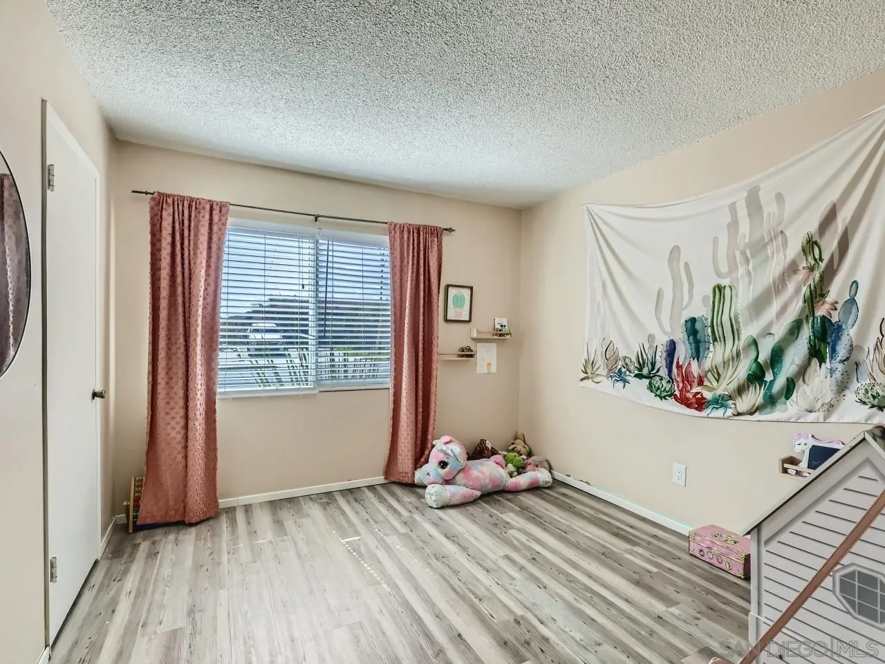 9456 Domer Road Santee, CA 92071 - Photo 15 of 30 a view of a room with window and hardwood floor