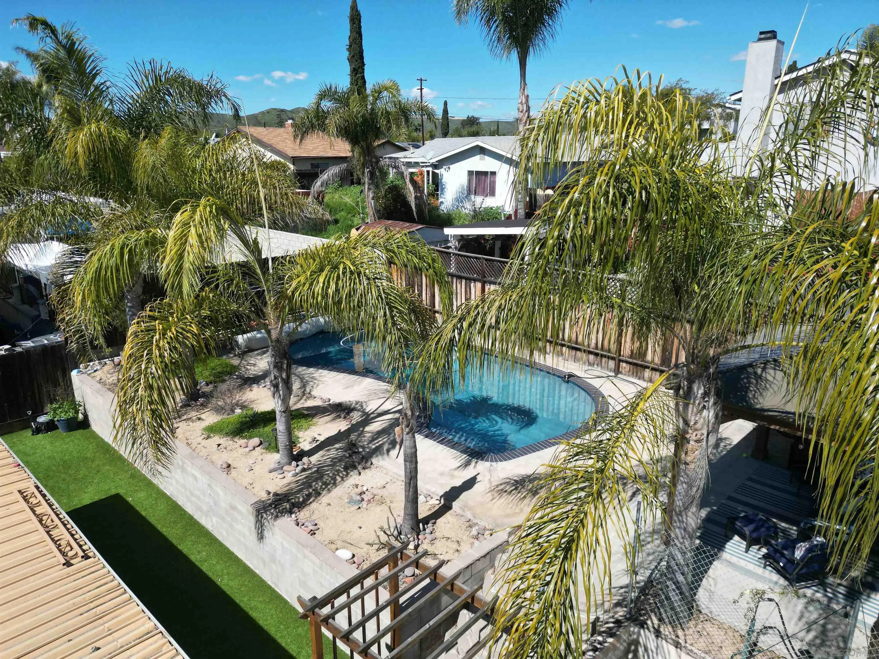9456 Domer Road Santee, CA 92071 - Photo 25 of 30 a view of a backyard with plants