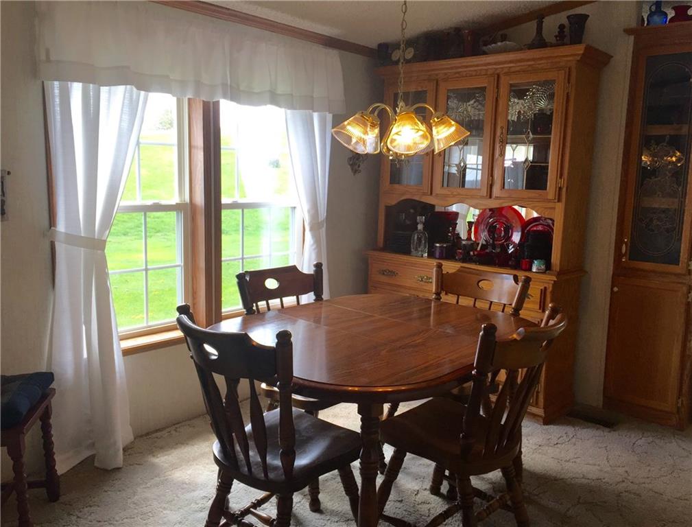 Spacious dining room opens to the kitchen