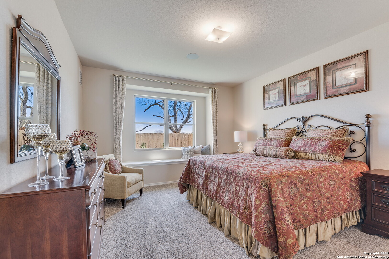 4947 Blue Ranch San Antonio, TX 78222 - Photo 11 of 27 a bedroom with a bed and a couch