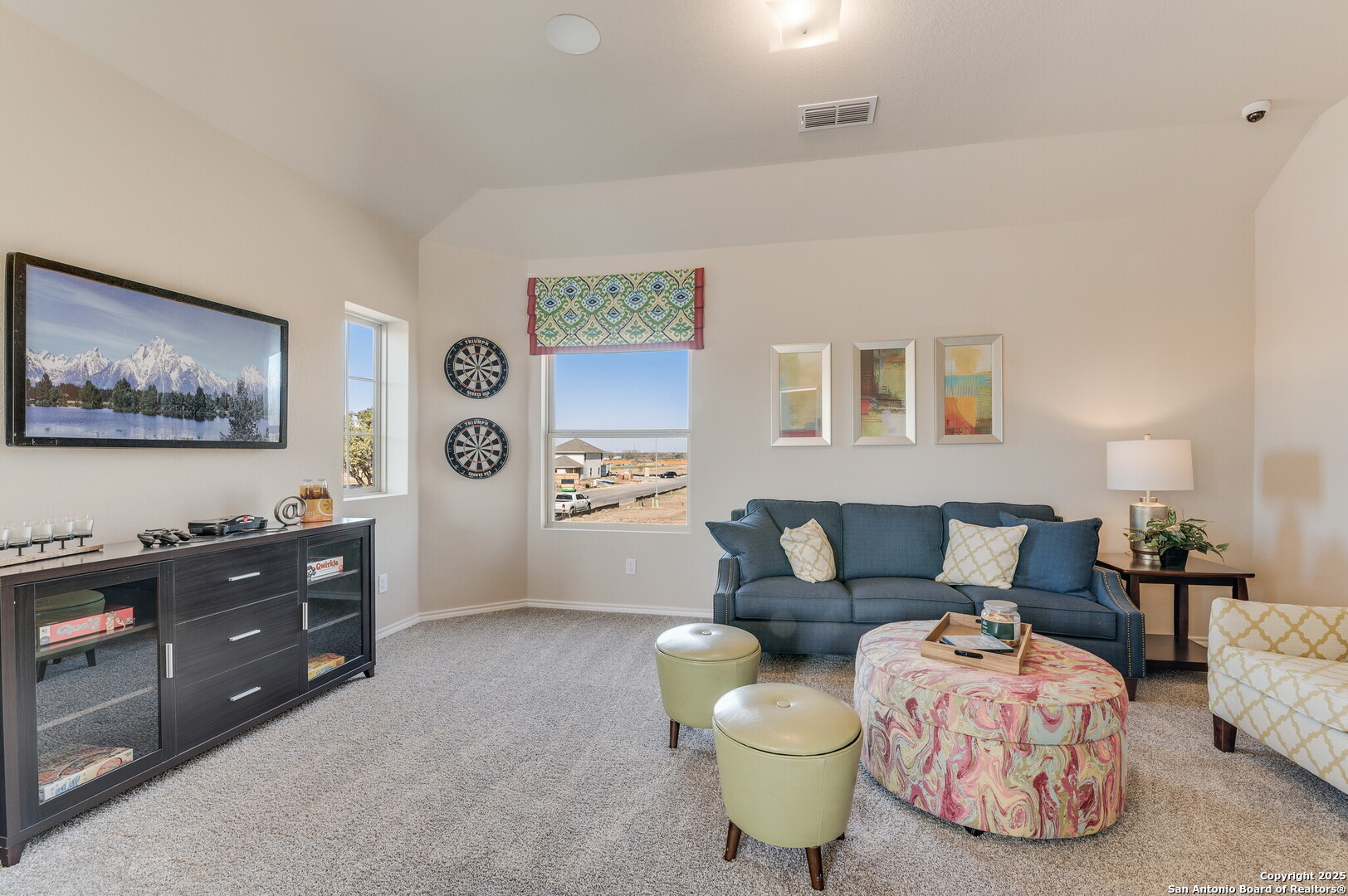4947 Blue Ranch San Antonio, TX 78222 - Photo 13 of 27 a living room with furniture and painting on the wall