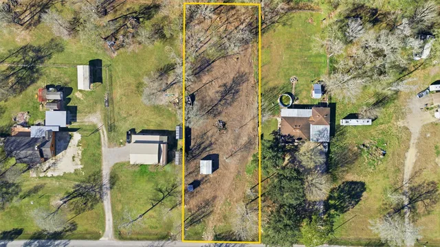 aerial view of residential house with outdoor space