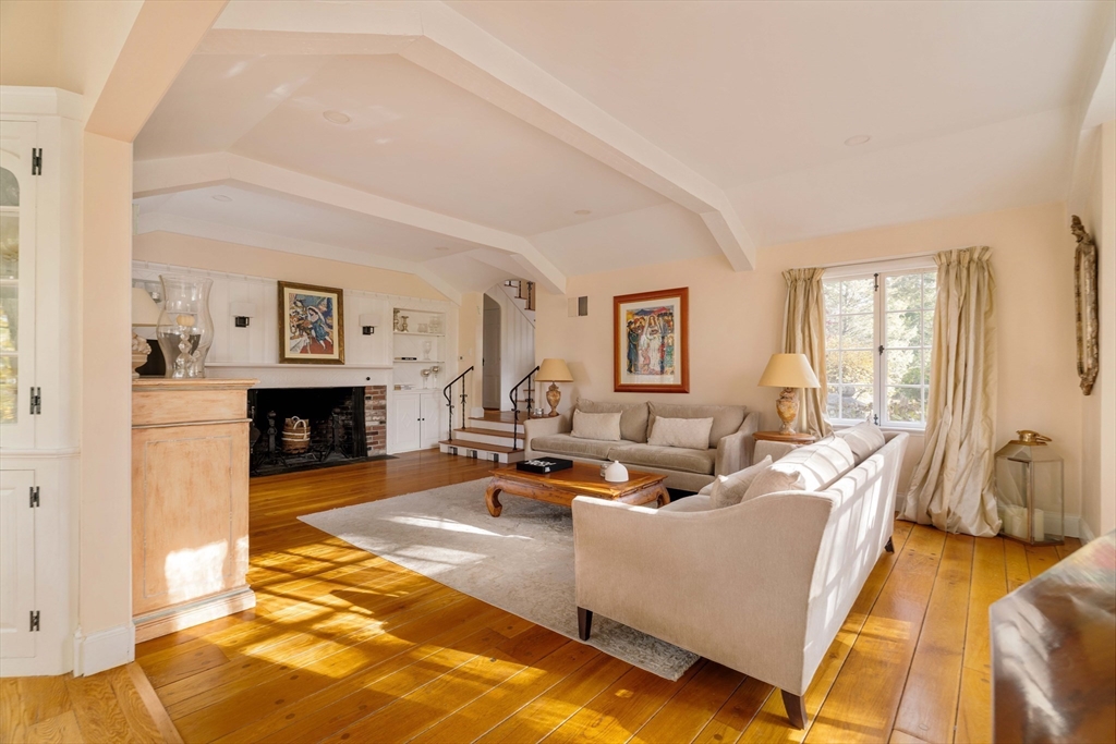 30 Prospect Street Winchester, MA 01890 - Photo 23 of 42 a living room with fireplace furniture and a rug