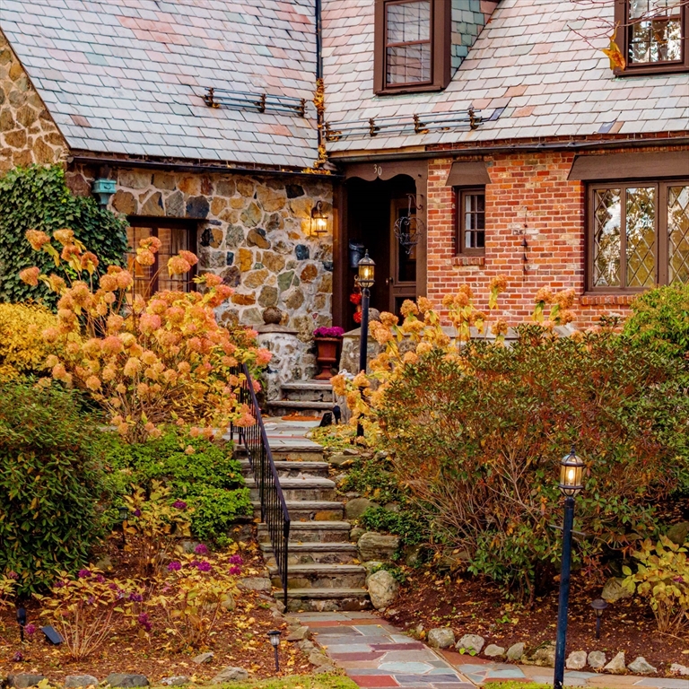 30 Prospect Street Winchester, MA 01890 - Photo 3 of 42 a front view of a house with parking