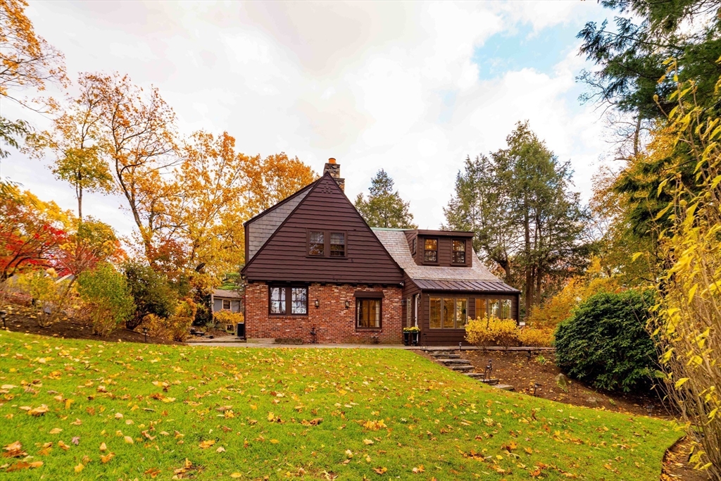 30 Prospect Street Winchester, MA 01890 - Photo 4 of 42 a front view of a house with a yard