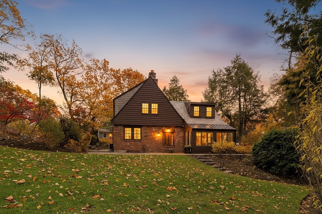 30 Prospect Street Winchester, MA 01890 - Photo 7 of 42 a front view of a house with a yard