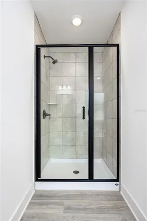 a view of a bathroom with a glass door