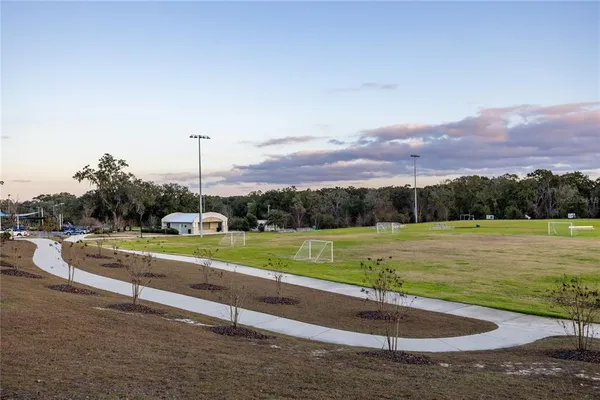 a view of a lake with a yard