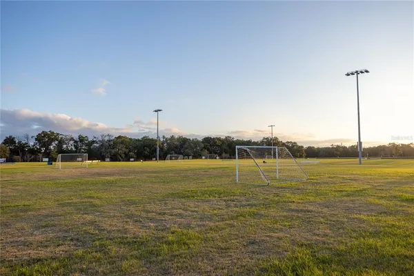 a view of an ocean with a large mountain view