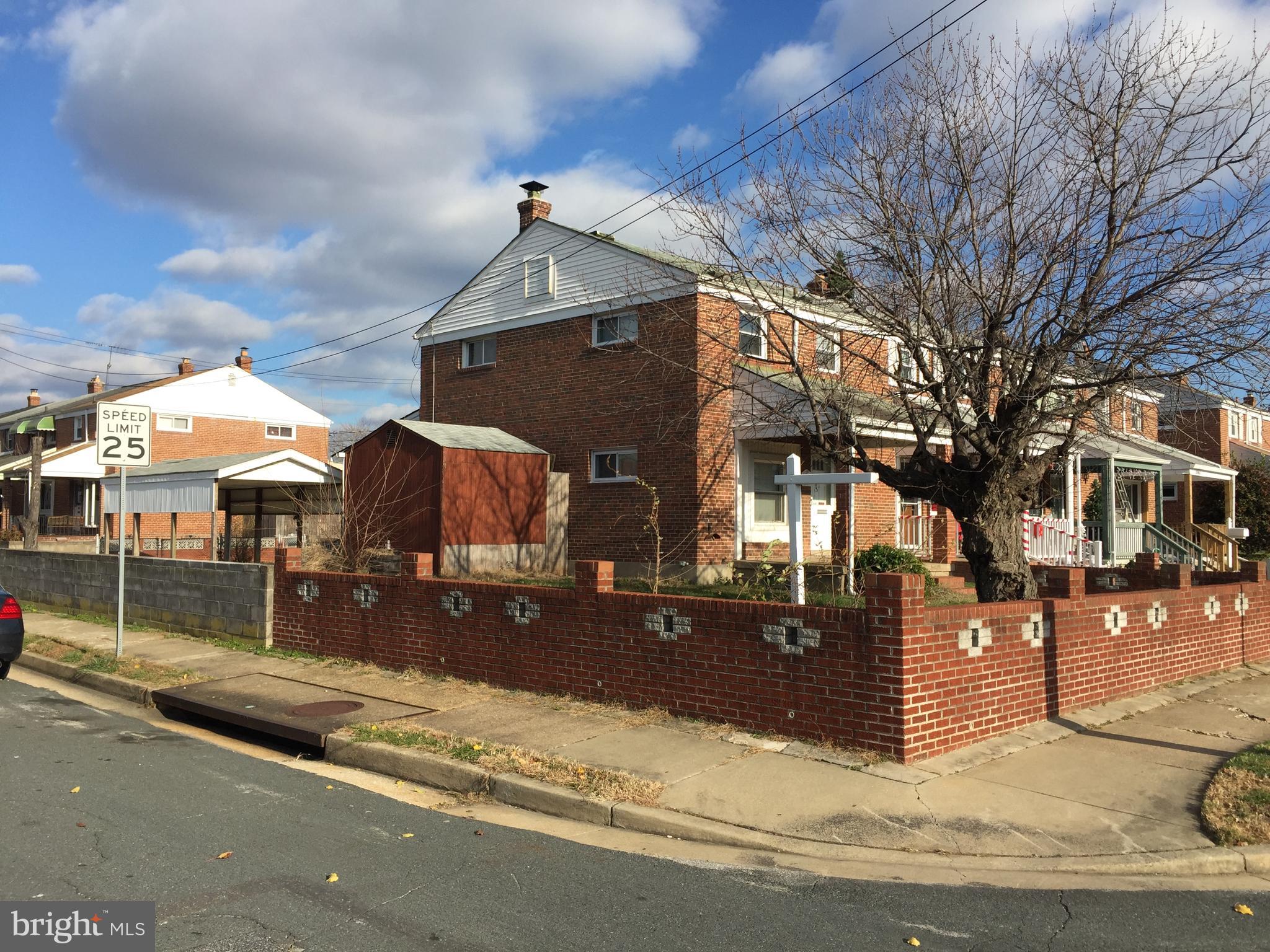 2800 Kirkleigh Road Baltimore, MD 21222 - Photo 2 of 6 a view of street with houses