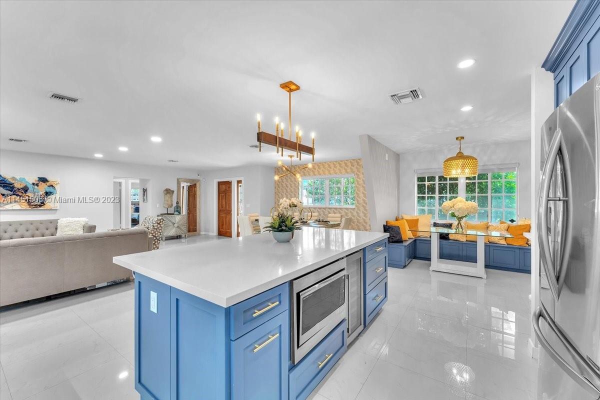 4103 Polk Street Hollywood, FL 33021 - Photo 11 of 55 a kitchen with sink and cabinets