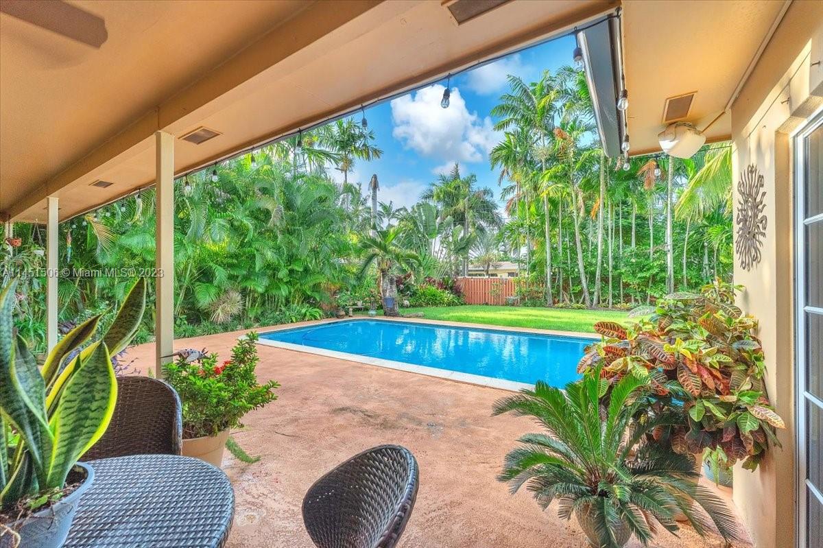 4103 Polk Street Hollywood, FL 33021 - Photo 36 of 55 a view of a swimming pool with a patio