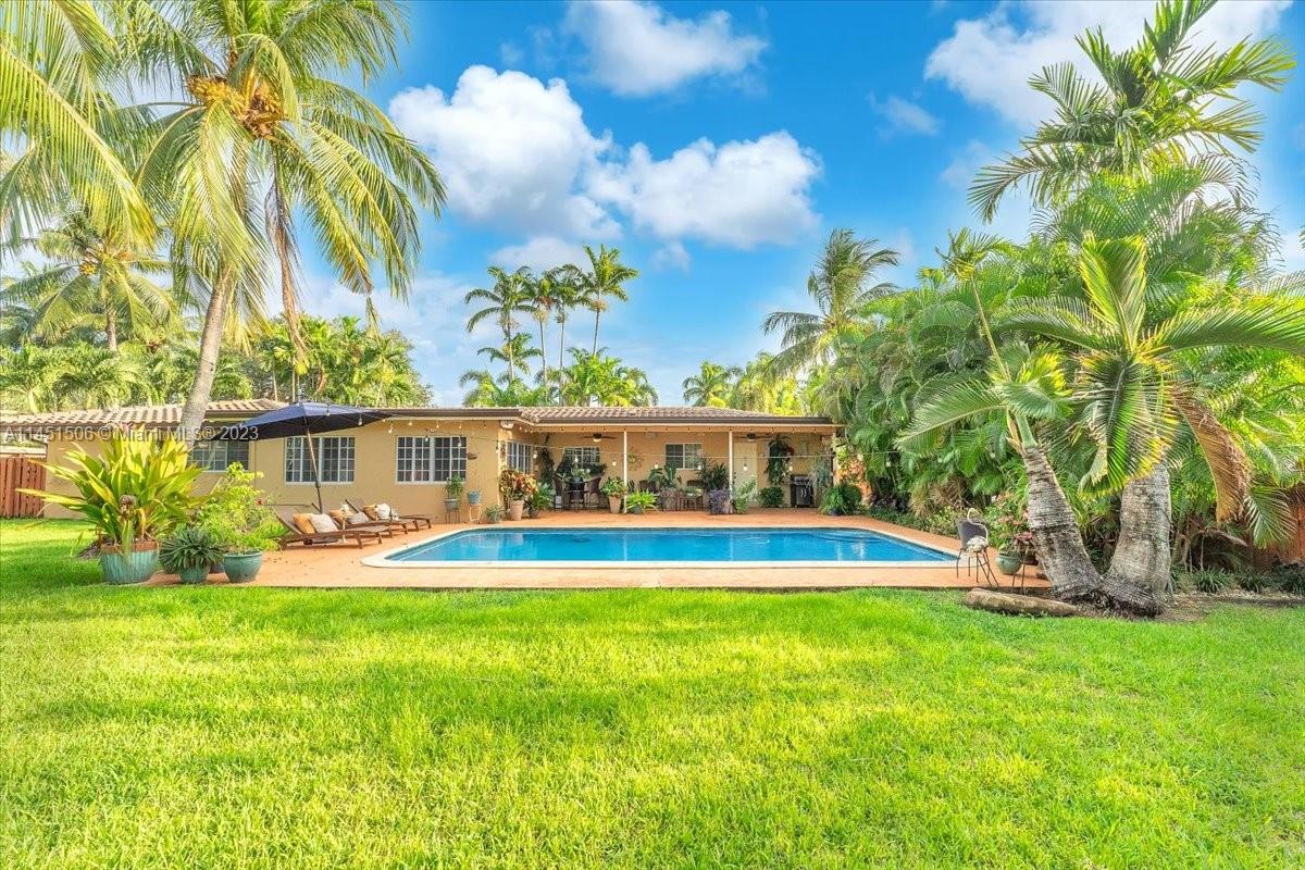 4103 Polk Street Hollywood, FL 33021 - Photo 44 of 55 a view of a house with a yard