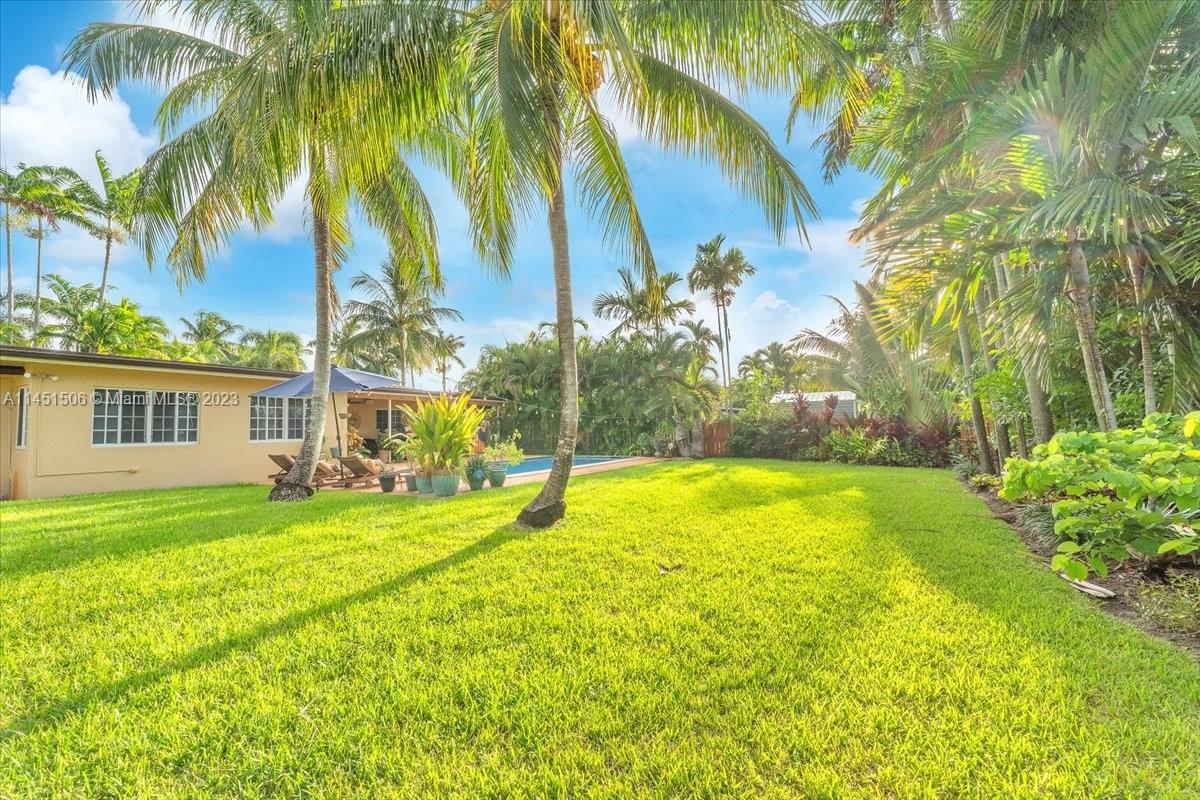 4103 Polk Street Hollywood, FL 33021 - Photo 46 of 55 a view of a house with a swimming pool