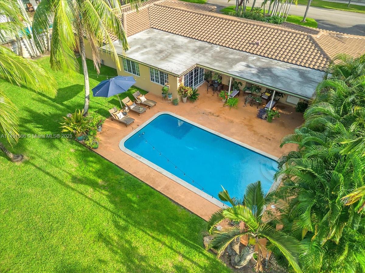 4103 Polk Street Hollywood, FL 33021 - Photo 48 of 55 an aerial view of a house with pool